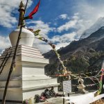 Chhorten in Manang with Annapurna mountain ranges in the background on Annapurna Circuit Trek - Nar Phu Valley Trek